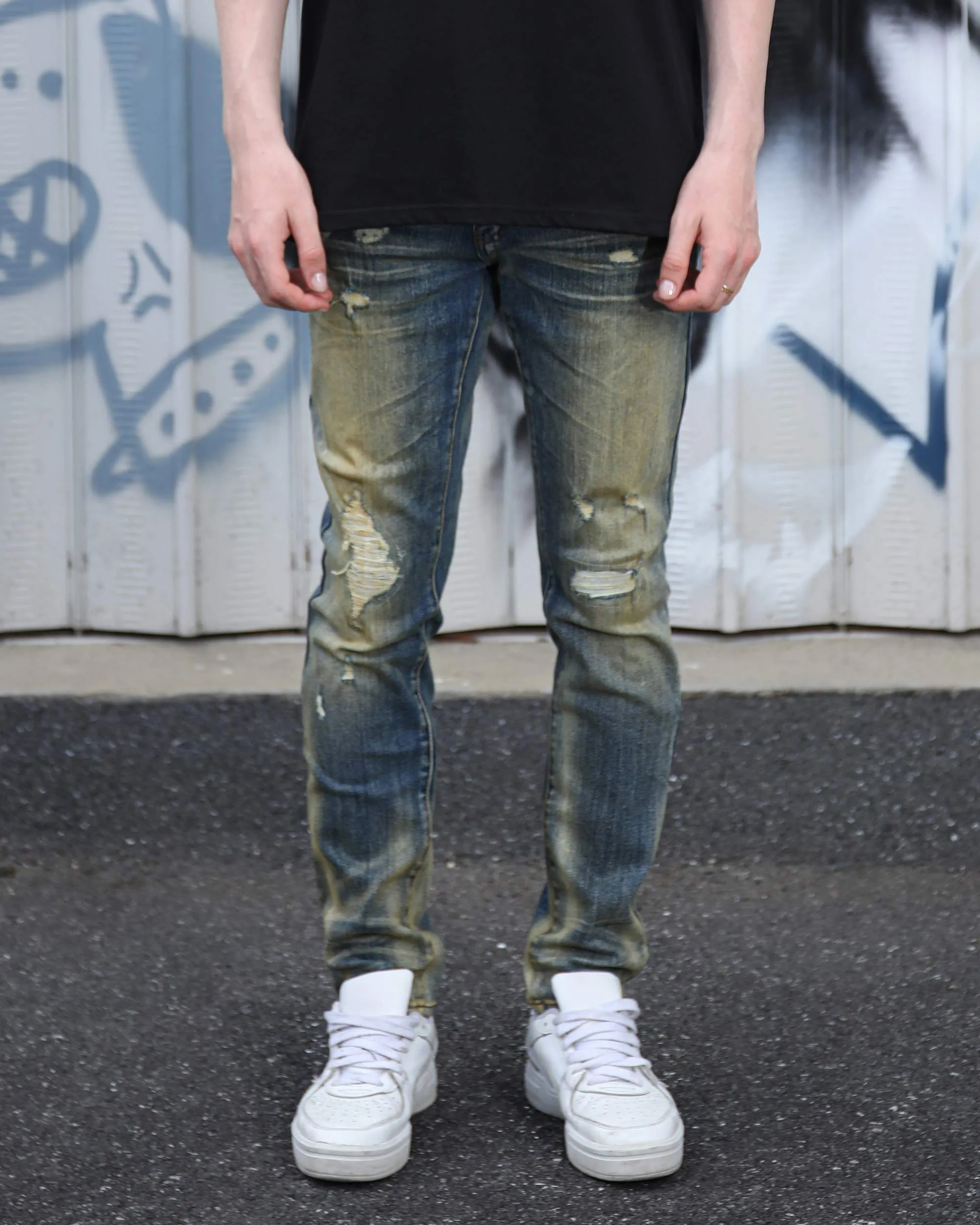 Irregularly Distressed Dark Wash Slim Fit Blue Ripped Jeans